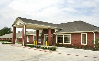 Front of brick building with drive thru and entrance